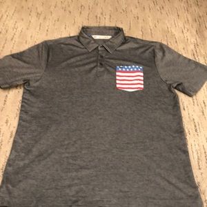 Men’s Travis Mathew polo star and stripes America flag pocket